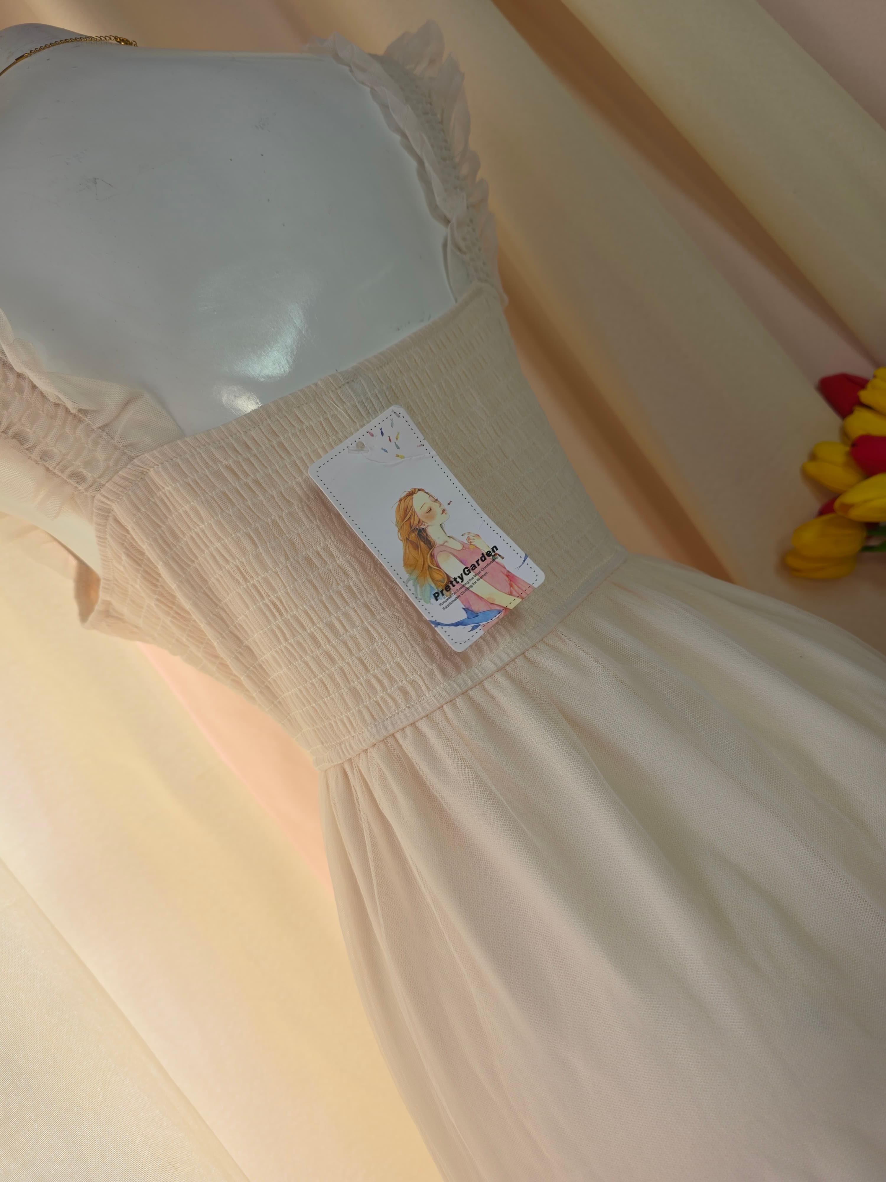 Vestido maxi blanco hueso con falda de tul